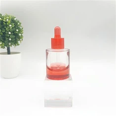 Червоні скляні пляшки-крапельниці